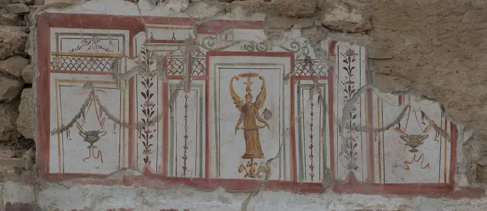 A wall painting with red panels, garlands and a small winged figure, Terrace Houses